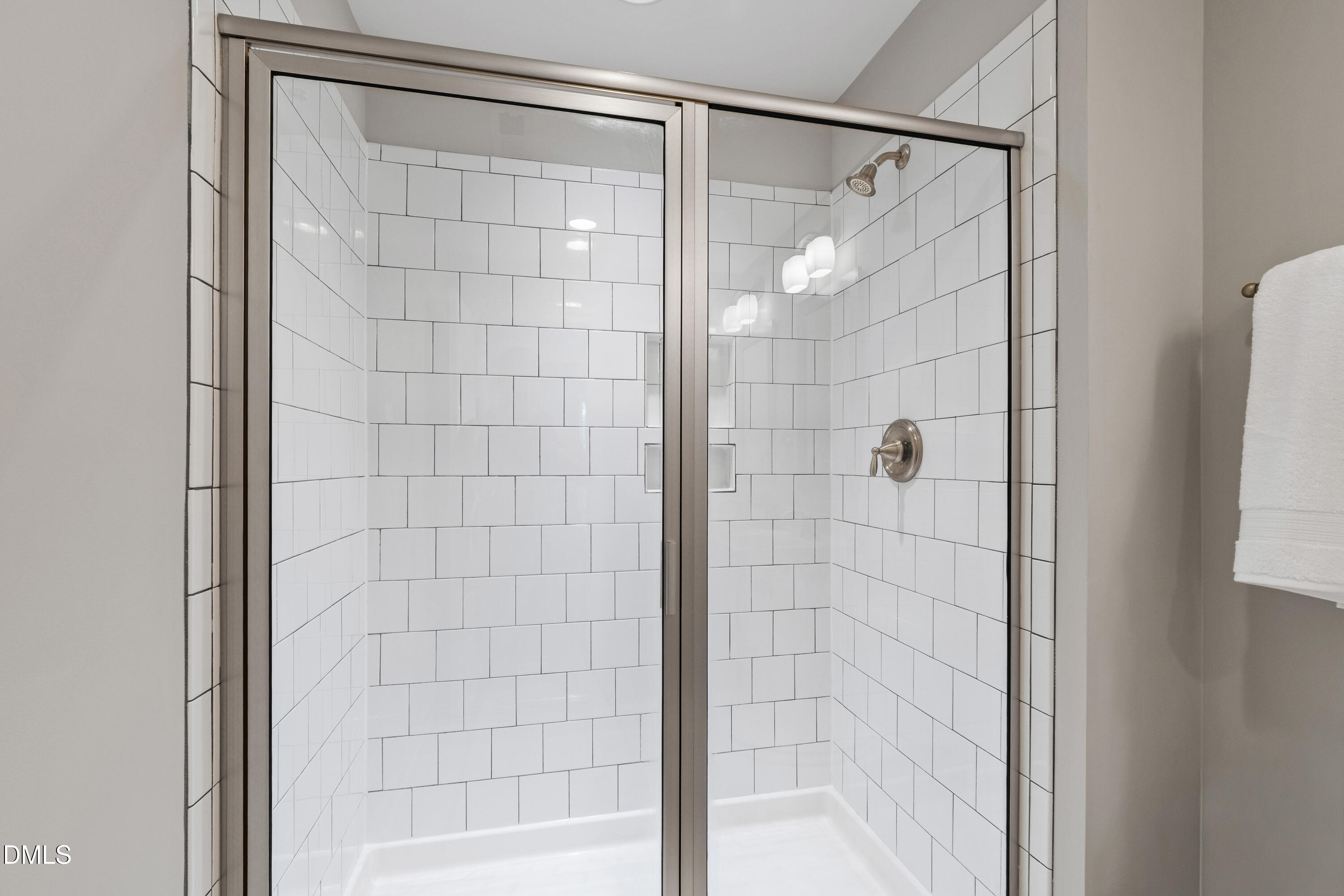 6246 Pesta Court Raleigh, NC 27612 - Photo 30 of 37 a bathroom with a glass shower door