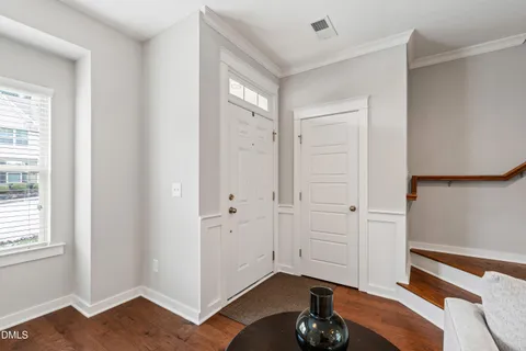 a view of entryway with wooden floor