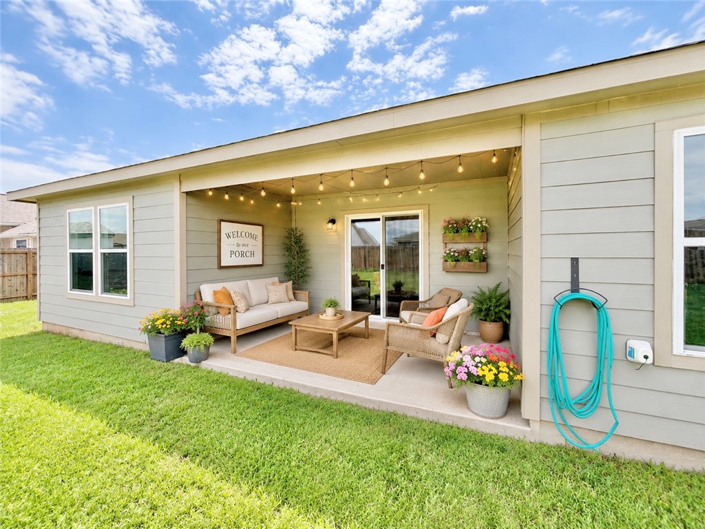 137 Windmill Road Somerville, TX 77879 - Photo 14 of 17 a backyard of a house with seating space