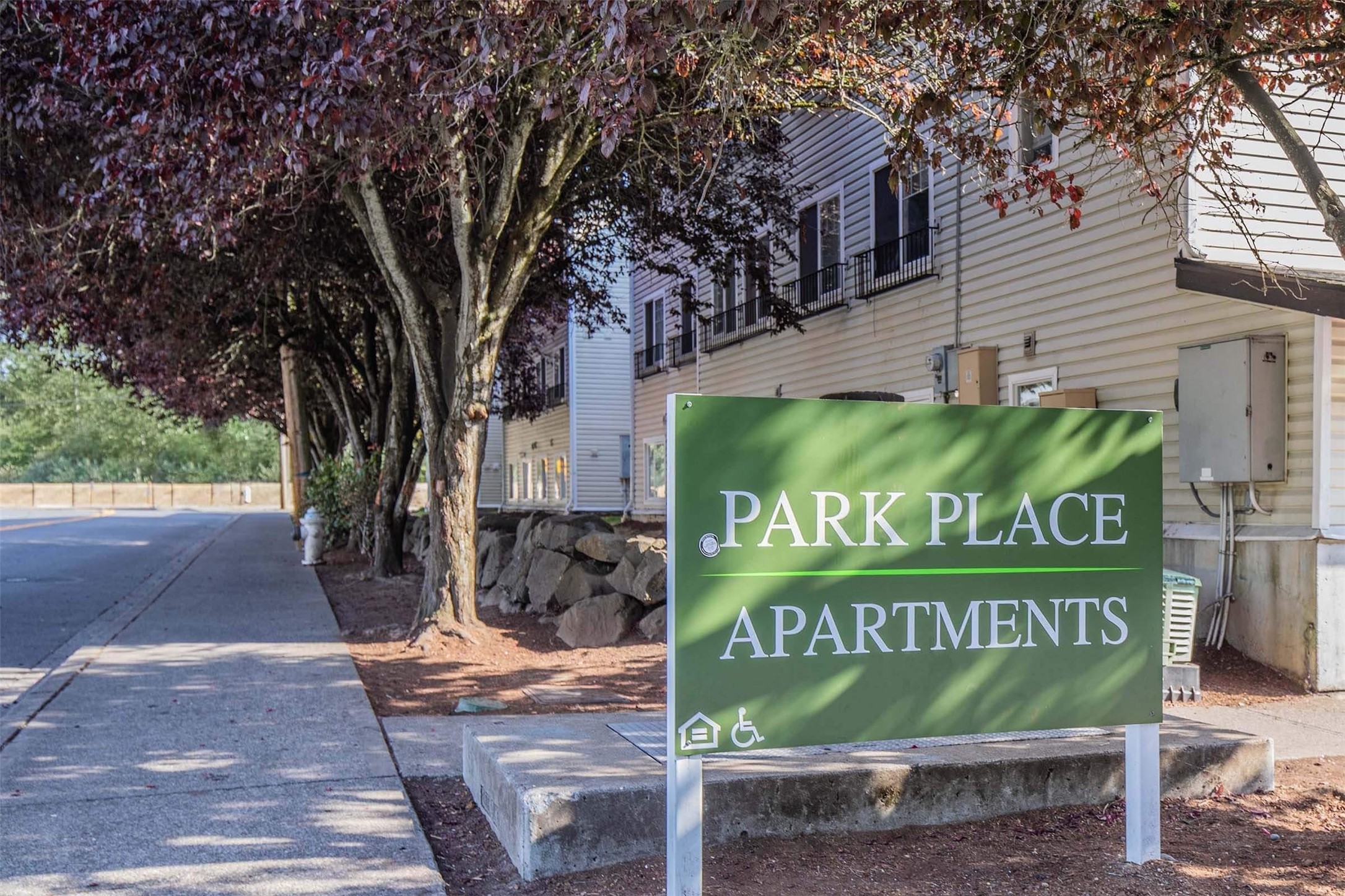 1406 Maple Lane Kent, WA 98030 - Photo 5 of 17 a sign on the side of a building