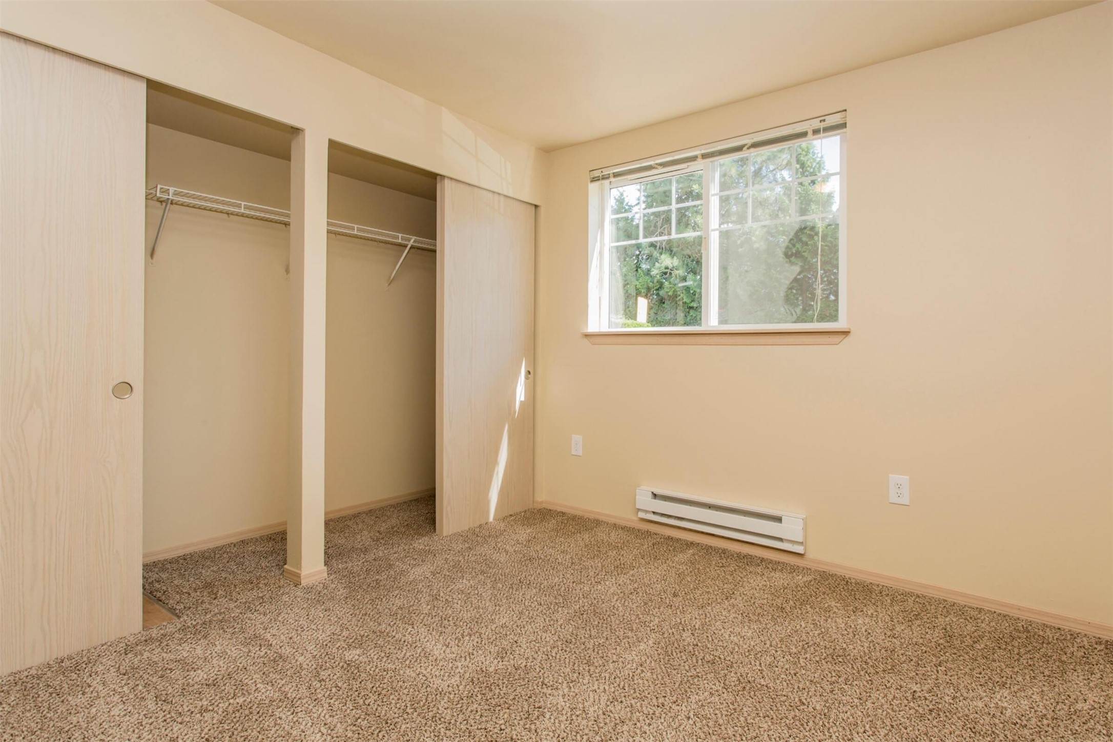 1406 Maple Lane Kent, WA 98030 - Photo 9 of 17 a view of an empty room with a window