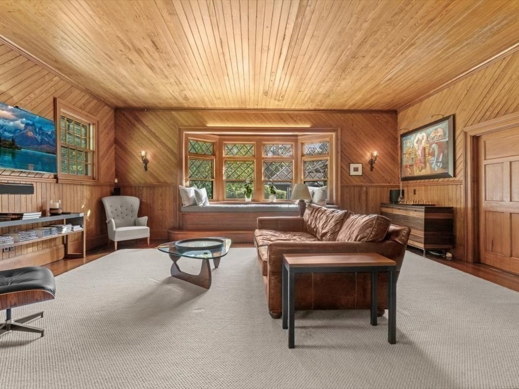 159 Bridge Street Manchester, MA 01944 - Photo 12 of 42 a living room with furniture a large window and table