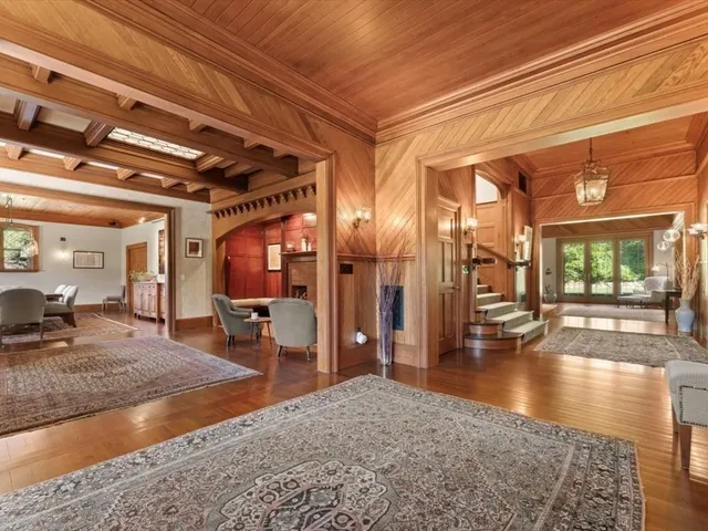 a view of a hall with the front door