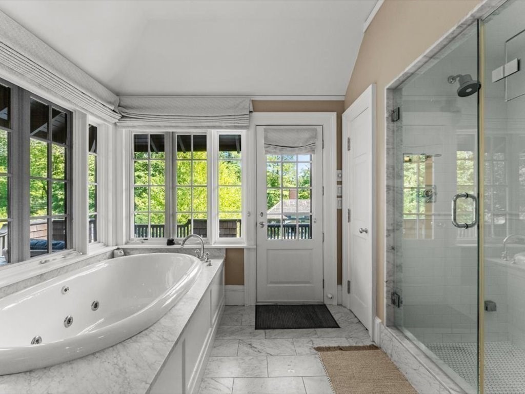 159 Bridge Street Manchester, MA 01944 - Photo 23 of 42 a bathroom with a bathtub and a shower