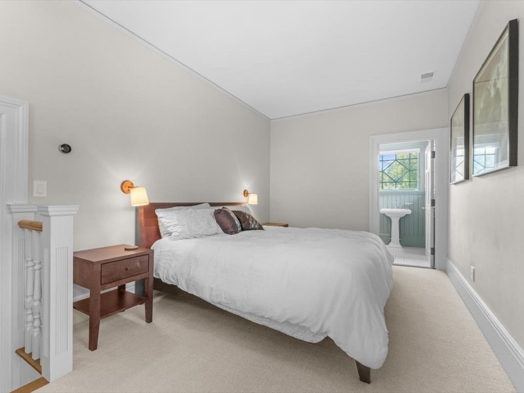 159 Bridge Street Manchester, MA 01944 - Photo 25 of 42 a bedroom with a bed and window