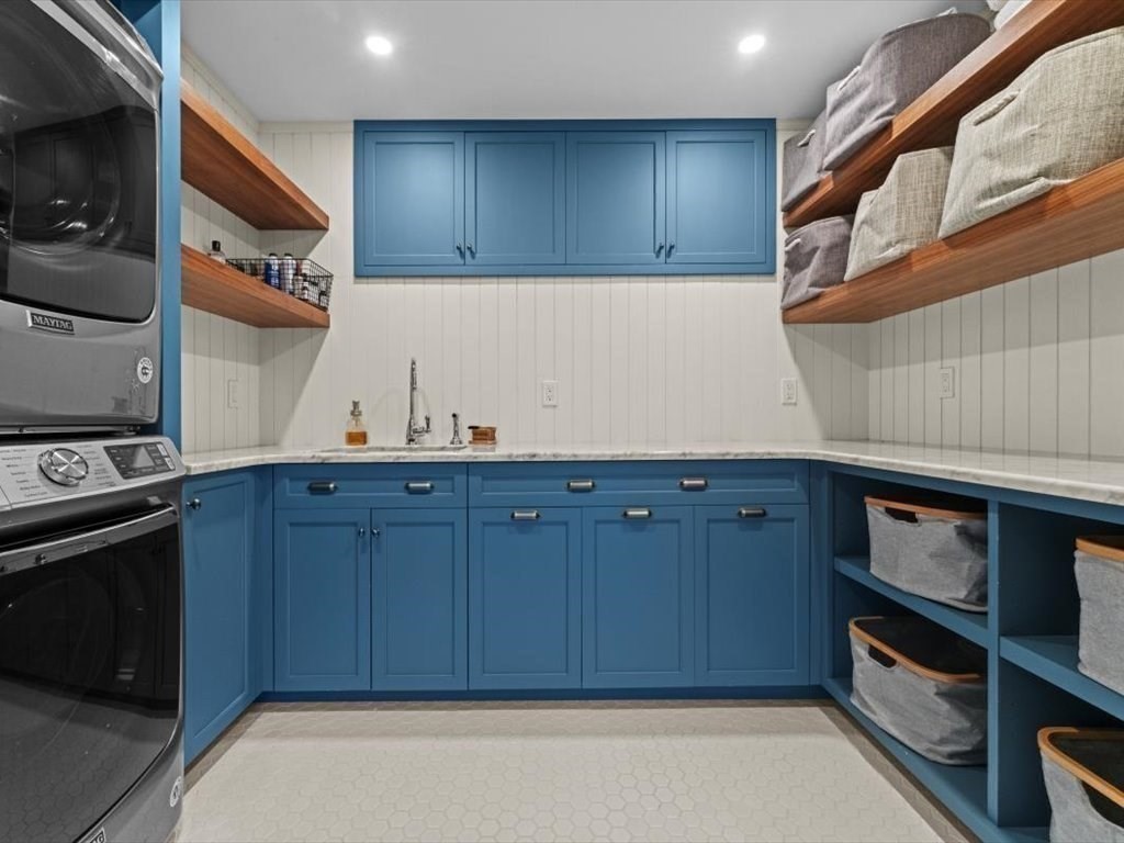 159 Bridge Street Manchester, MA 01944 - Photo 27 of 42 a kitchen with wooden cabinets and a stove