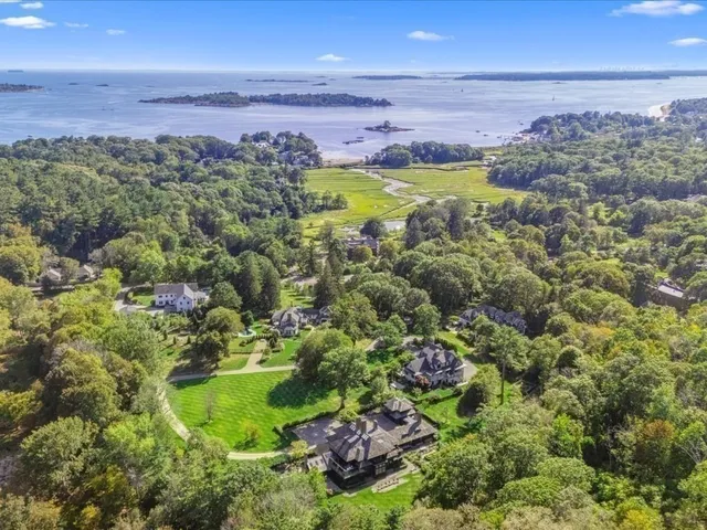 a view of a houses with ocean view