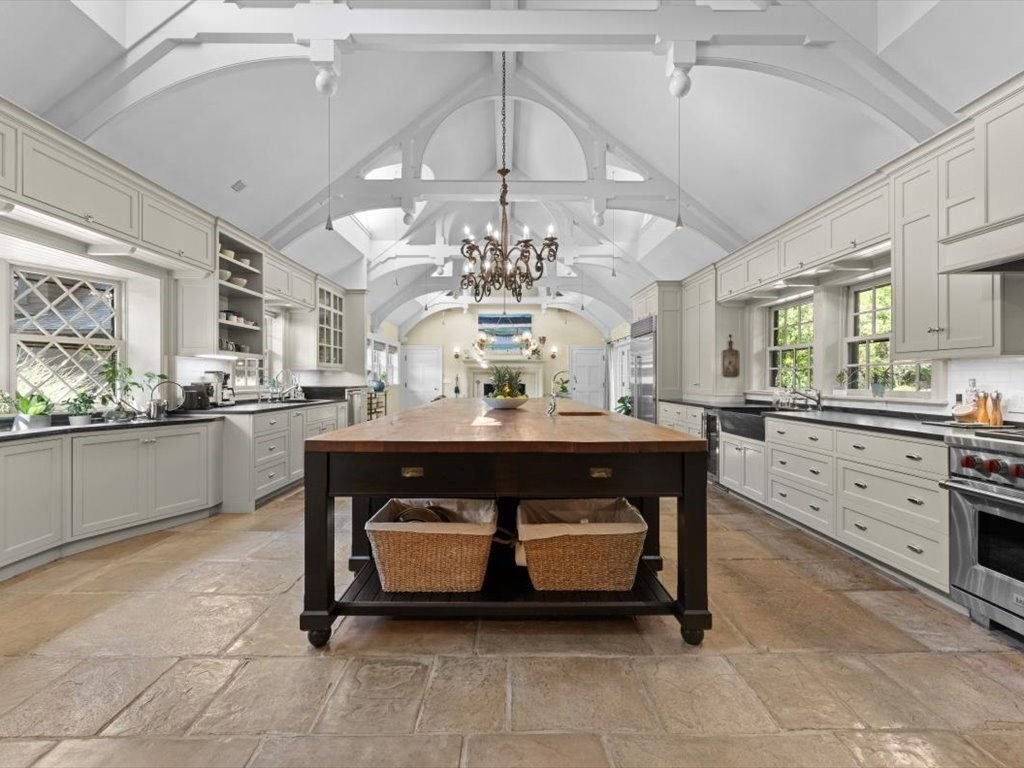 159 Bridge Street Manchester, MA 01944 - Photo 6 of 42 a living room with stainless steel appliances kitchen island granite countertop furniture and a chandelier