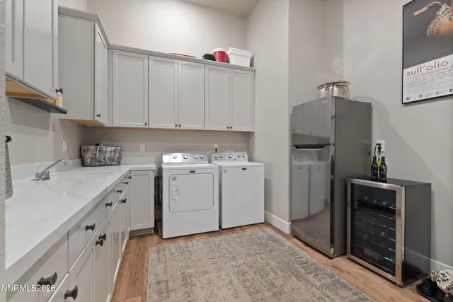 a kitchen with cabinets and white appliances
