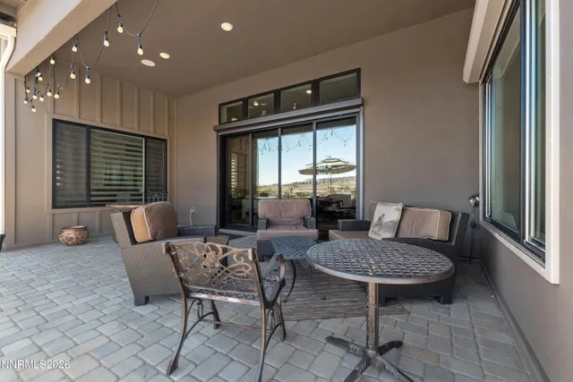 a view of a terrace with furniture