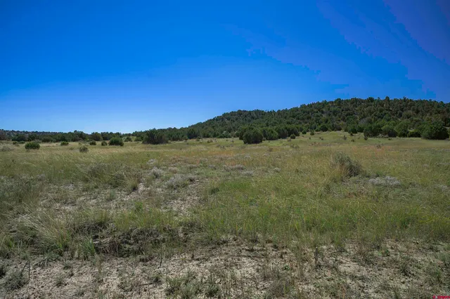 a view of mountain with sunset view