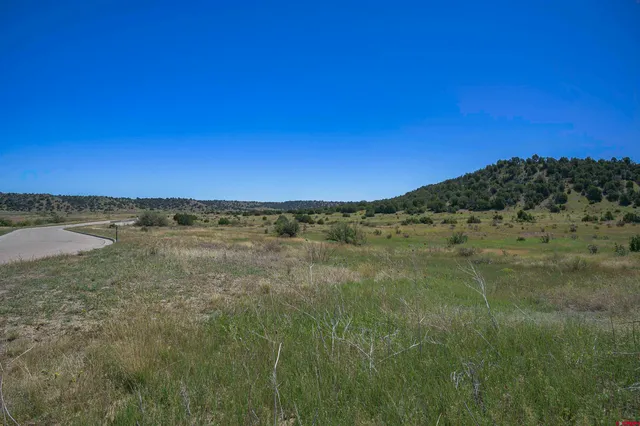 a view of mountain with sunset view