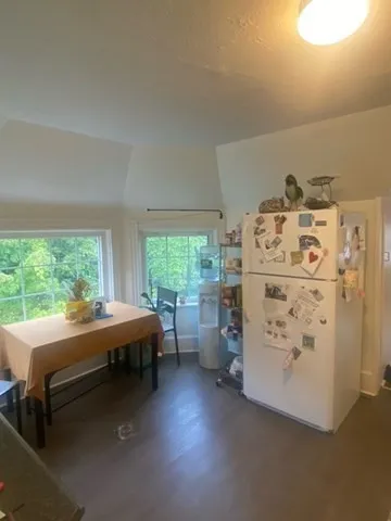 a room with furniture and a large window