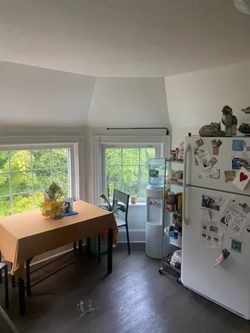 a room with furniture and a window