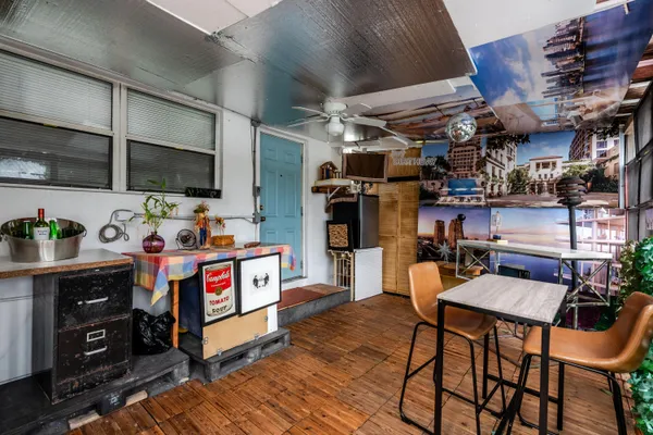 a view of a kitchen with appliances and cabinets