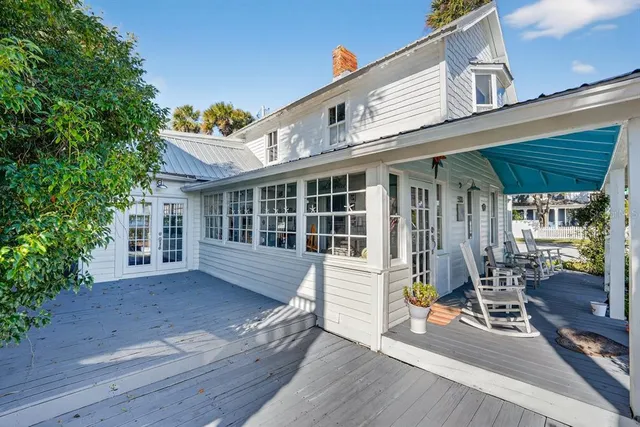 a kitchen with stainless steel appliances granite countertop a refrigerator and a stove