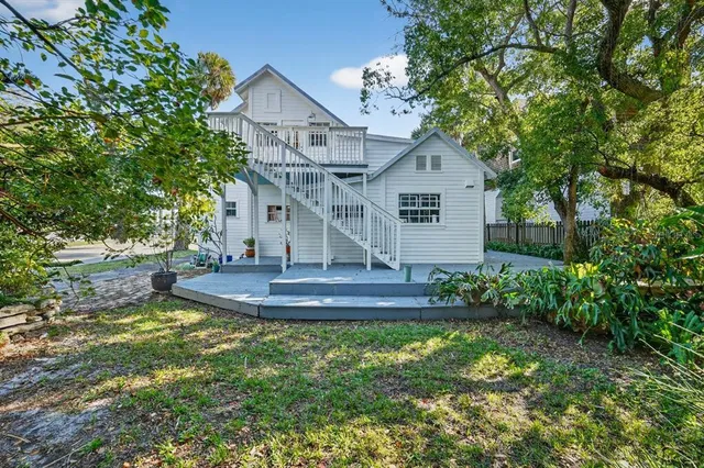 a view of a livingroom with furniture and a flat screen tv
