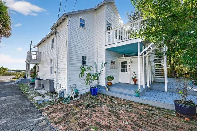 a bathroom with a toilet sink and shower
