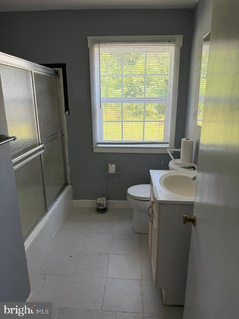 106 Fischer Road Grasonville, MD 21638 - Photo 3 of 8 a bathroom with a sink toilet and a bathtub