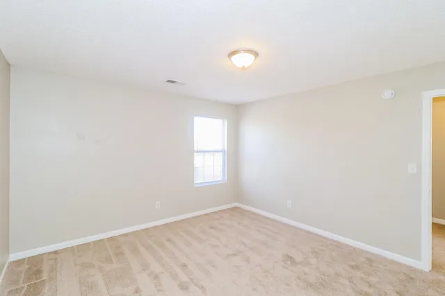 an empty room with a window