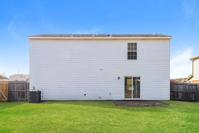 a view of a backyard with plants