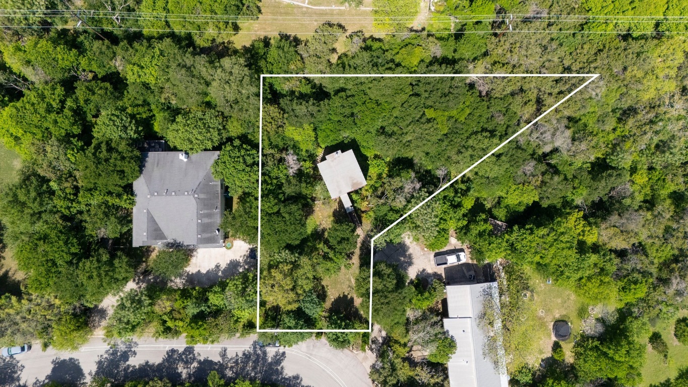 20 North Peak Road West Lake Hills, TX 78746 - Photo 2 of 18 an aerial view of a house with a yard and garden