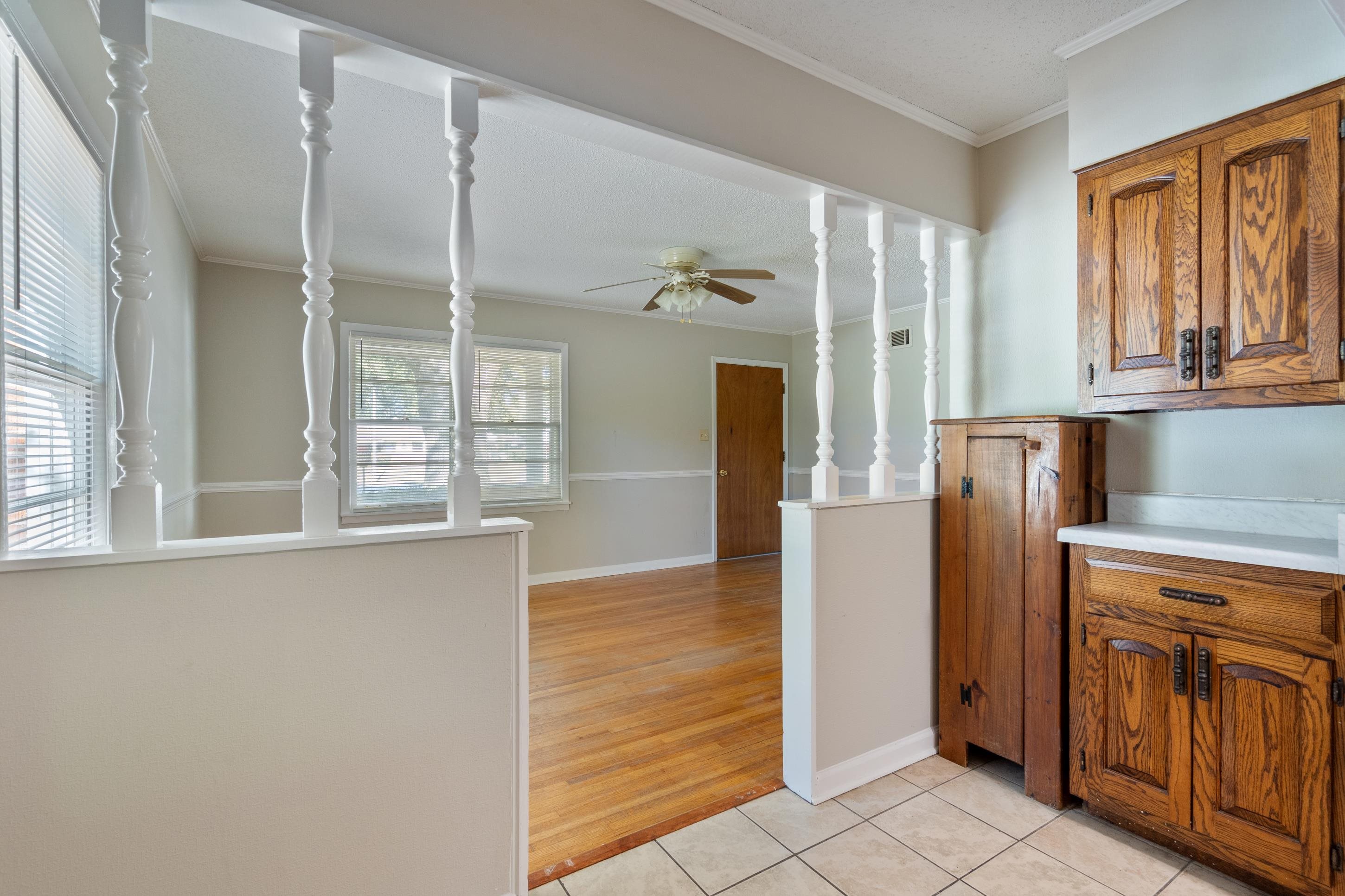 4797 Helene Road Memphis, TN 38117 - Photo 7 of 21 a kitchen with stainless steel appliances granite countertop a refrigerator and a stove