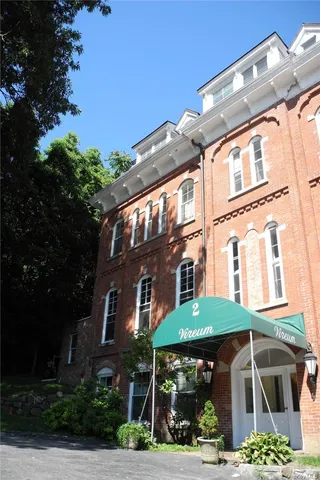 a view of a building with a porch