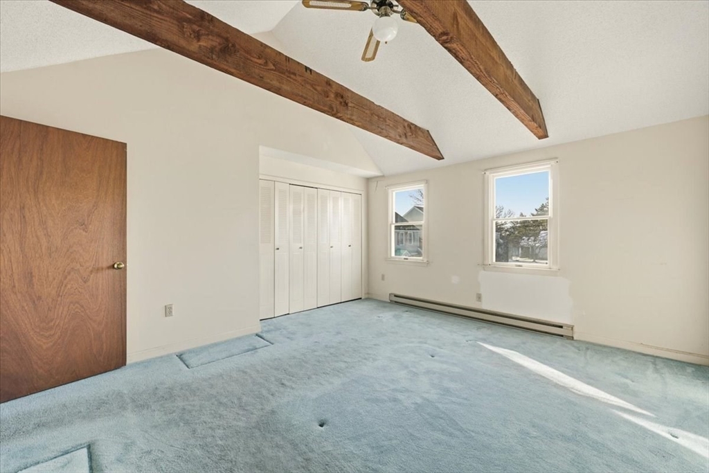 87 Victoria Heights Road, Unit 87 Boston, MA 02136 - Photo 20 of 32 an empty room with windows