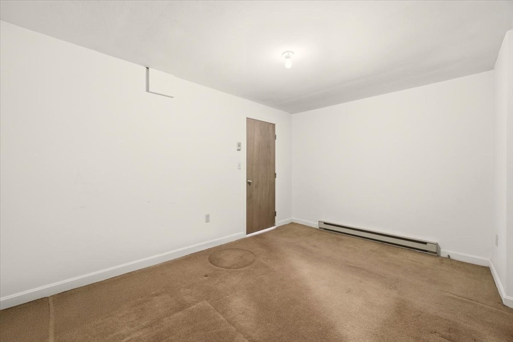 87 Victoria Heights Road, Unit 87 Boston, MA 02136 - Photo 25 of 32 a view of an empty room