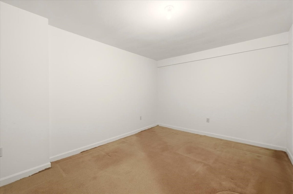 87 Victoria Heights Road, Unit 87 Boston, MA 02136 - Photo 26 of 32 a view of an empty room