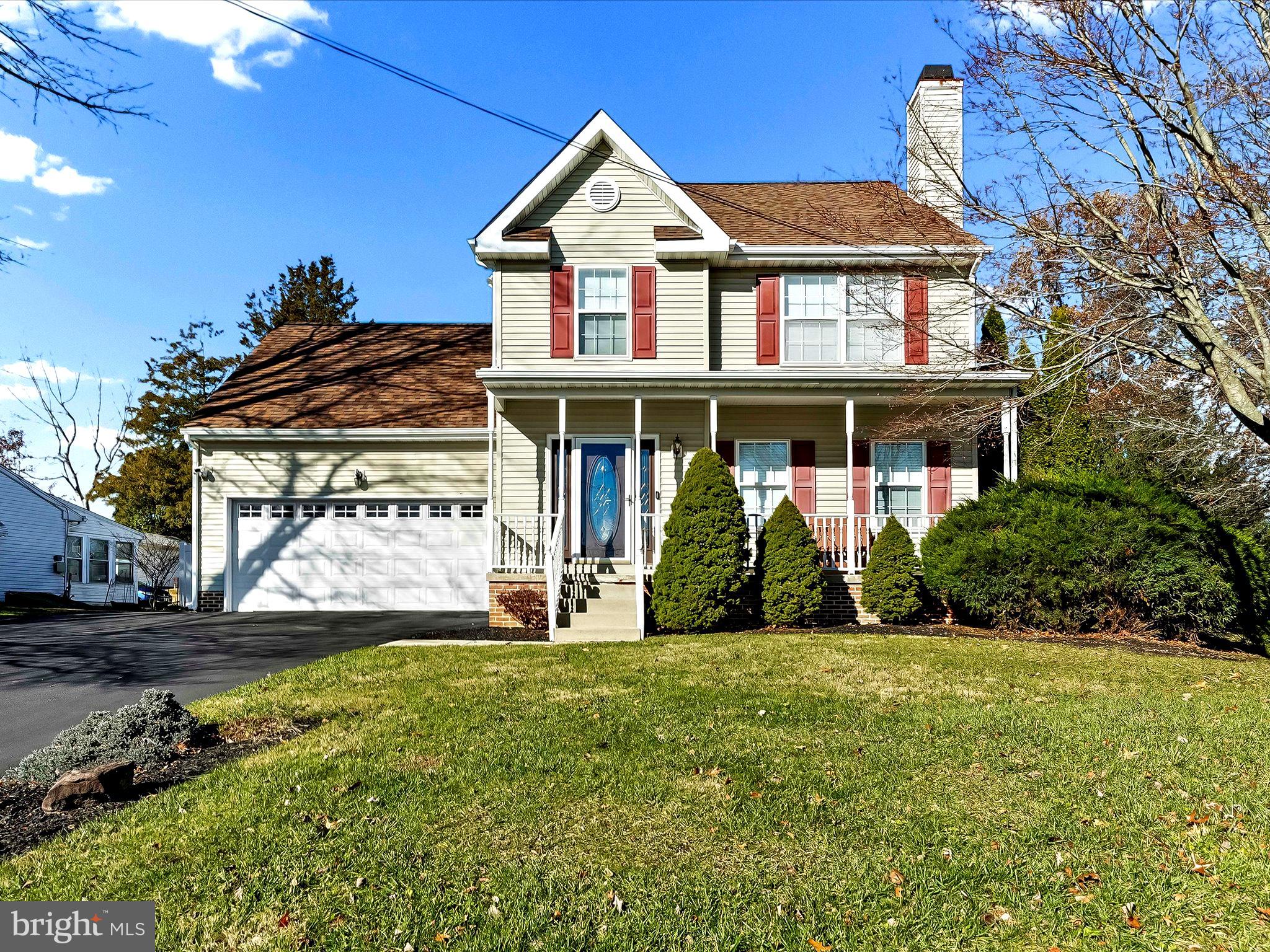 2410 Larkin Road Upper Chichester, PA 19061 - Photo 3 of 50 a front view of a house with a yard