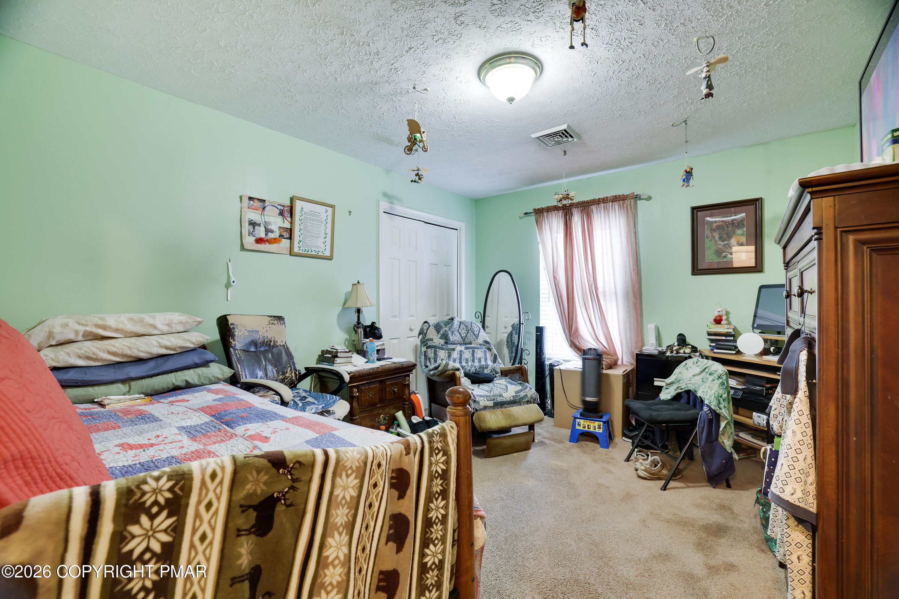 2137 Freedom Way Pocono Summit, PA 18346 - Photo 17 of 71 a bed room with two bed and a chair