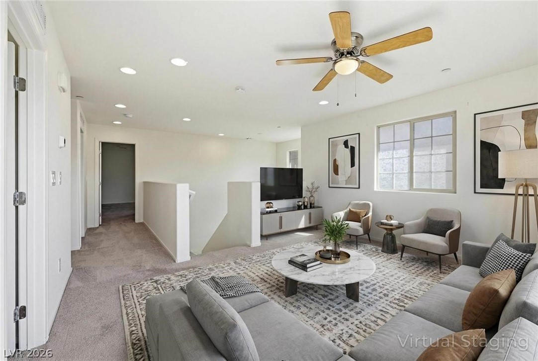 250 Dedication Avenue Henderson, NV 89011 - Photo 29 of 67 Living room featuring light colored carpet, recessed lighting, and a ceiling fan