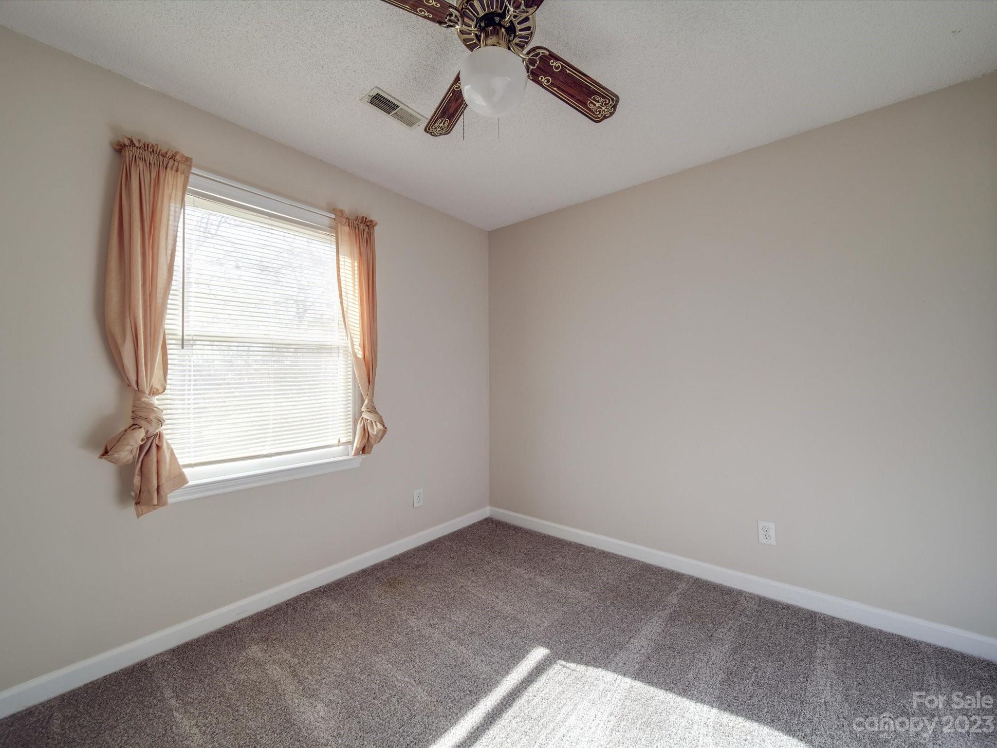 8009 Lighthouse Way Indian Trail, NC 28079 - Photo 18 of 26 an empty room with a window