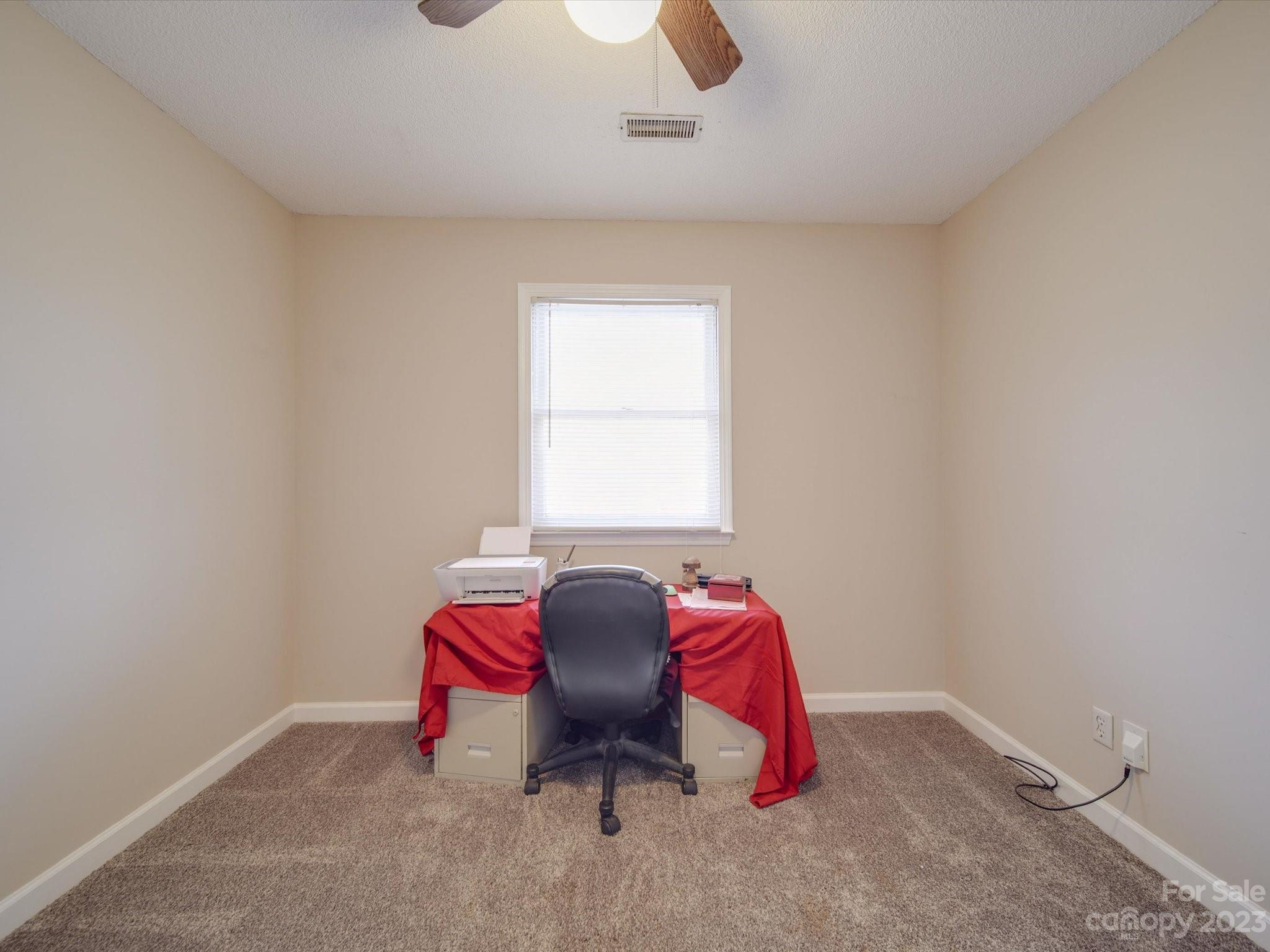 8009 Lighthouse Way Indian Trail, NC 28079 - Photo 19 of 26 a room with a window and ample daylight