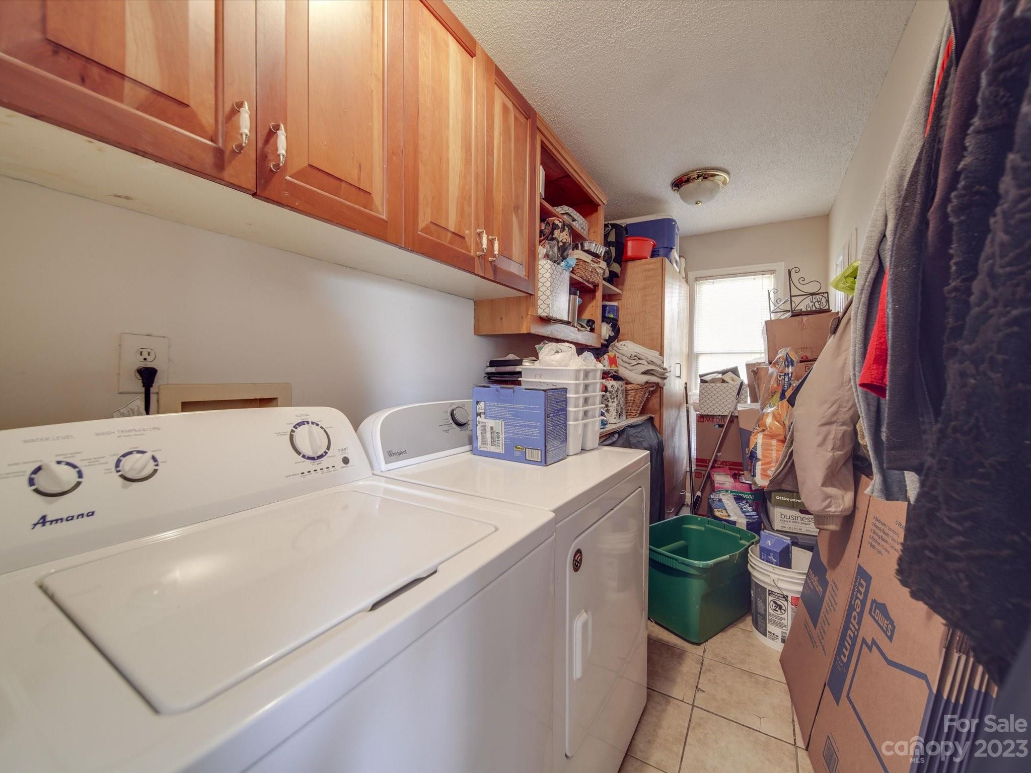 8009 Lighthouse Way Indian Trail, NC 28079 - Photo 21 of 26 a utility room with dryer and washer