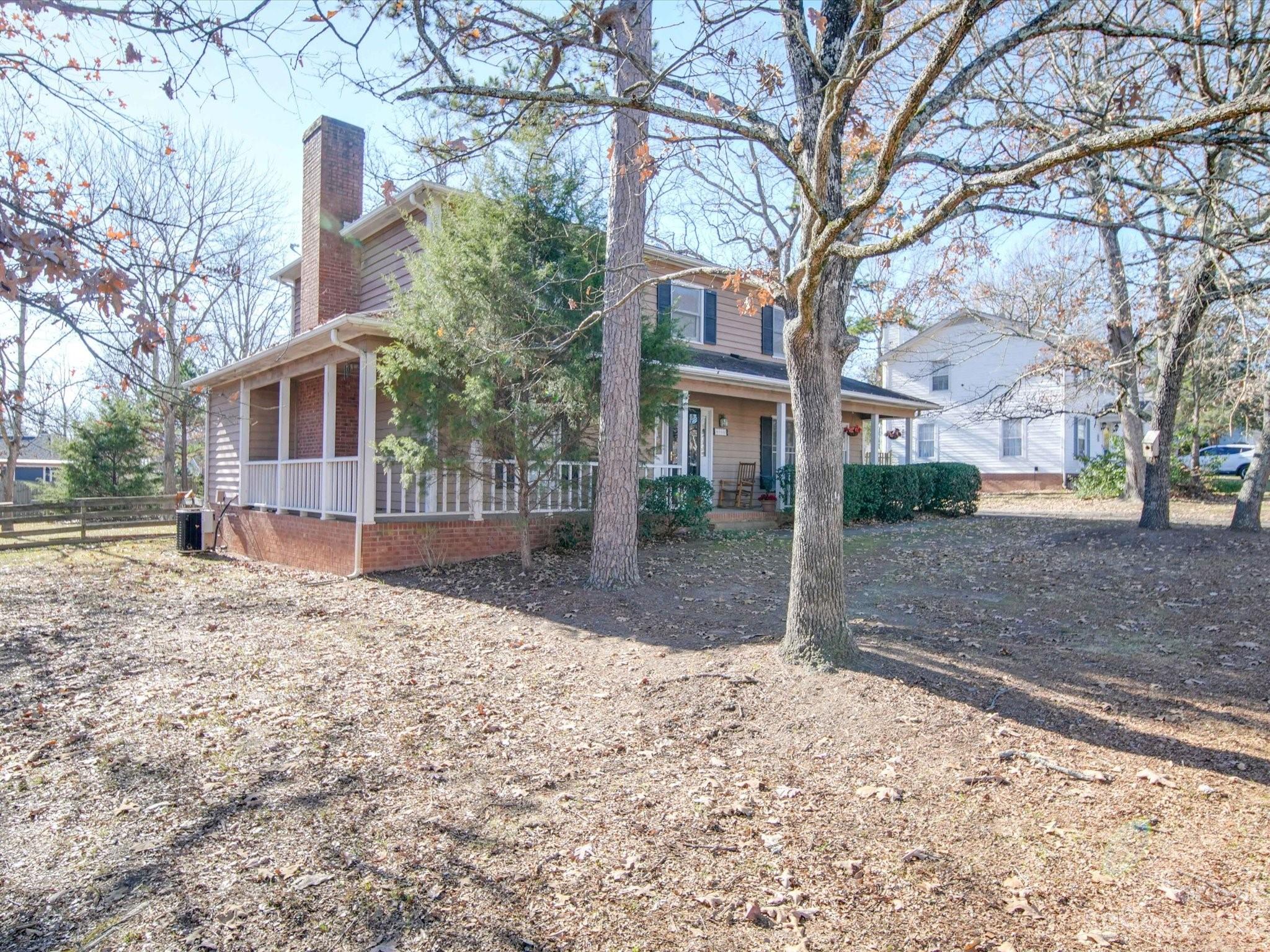 8009 Lighthouse Way Indian Trail, NC 28079 - Photo 24 of 26 a view of a house with a yard covered in snow