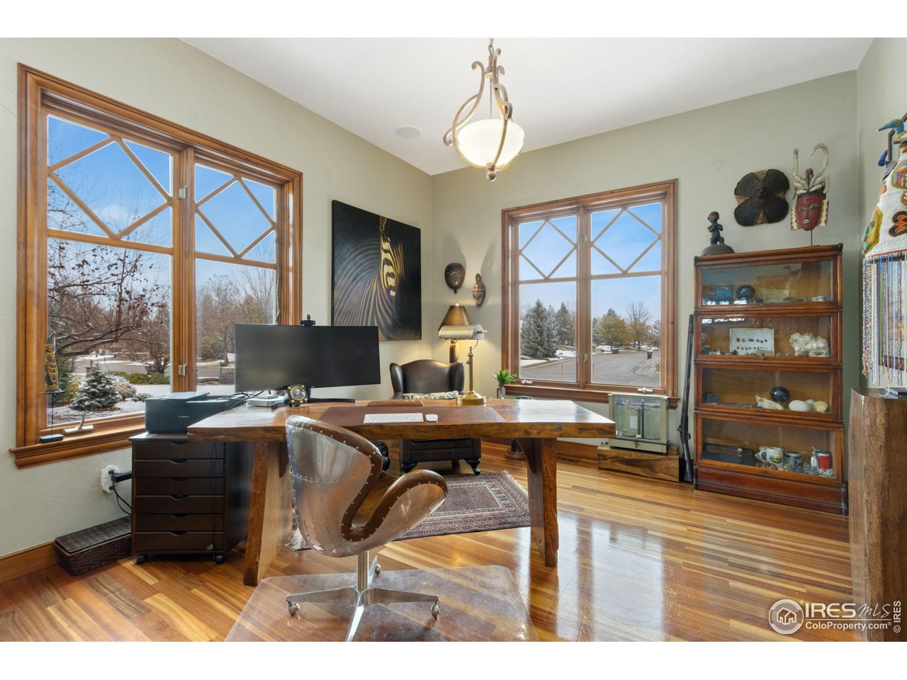 8467 Golden Eagle Road Fort Collins, CO 80528 - Photo 14 of 40 a view of a workspace with furniture