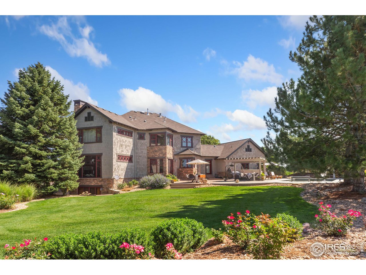 8467 Golden Eagle Road Fort Collins, CO 80528 - Photo 37 of 40 a view of house with garden
