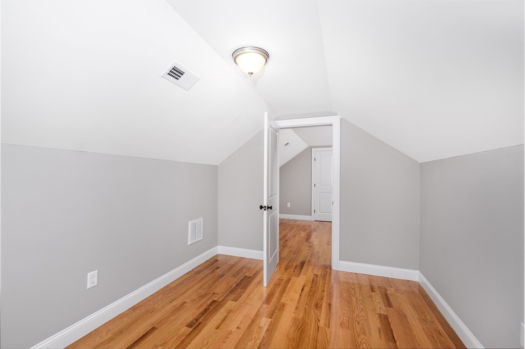 216 Vane Street, Unit 1 Revere, MA 02151 - Photo 10 of 22 a view of empty room with wooden floor