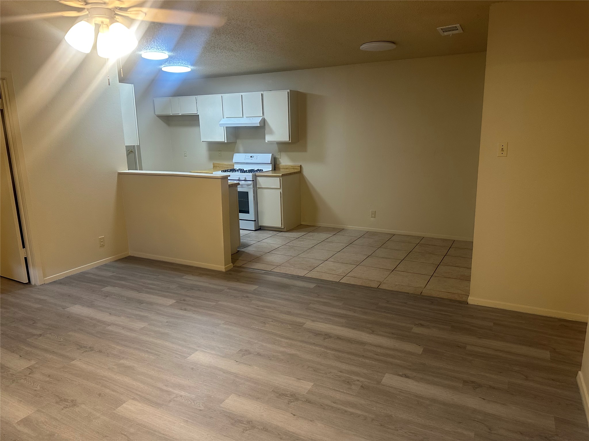 2602 South Bagdad Road, Unit A Leander, TX 78641 - Photo 26 of 26 An open floorplan seamlessly connects the living area with a functional kitchen.