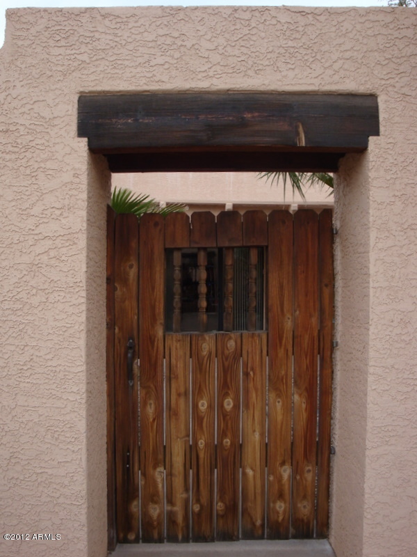 6933 East Doubletree Ranch Road Paradise Valley, AZ 85253 - Photo 22 of 30 a view of a wooden door