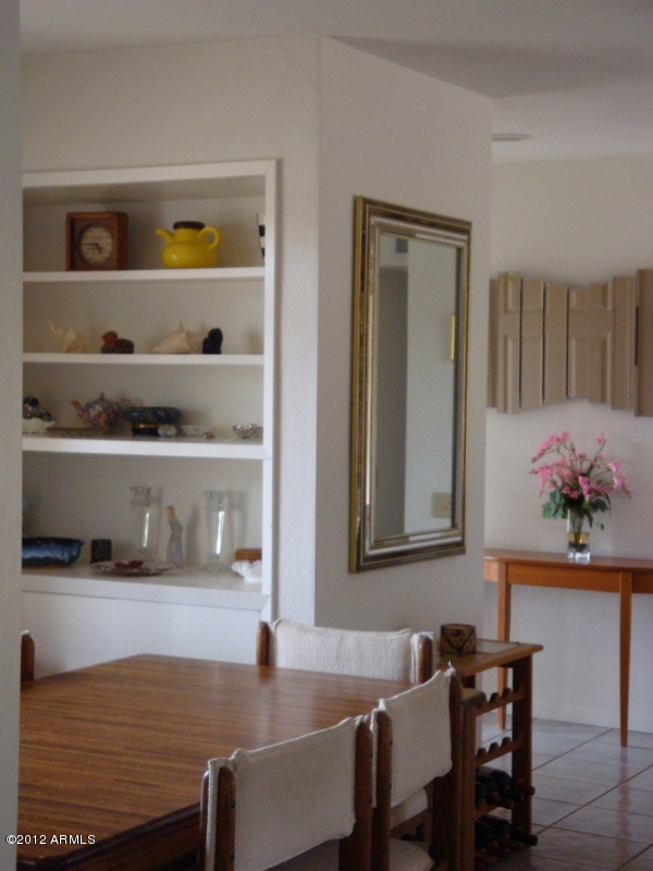 6933 East Doubletree Ranch Road Paradise Valley, AZ 85253 - Photo 5 of 30 a view of a dining room with furniture and window