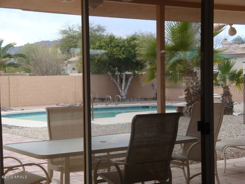 6933 East Doubletree Ranch Road Paradise Valley, AZ 85253 - Photo 9 of 30 a view of a chair and table in the balcony