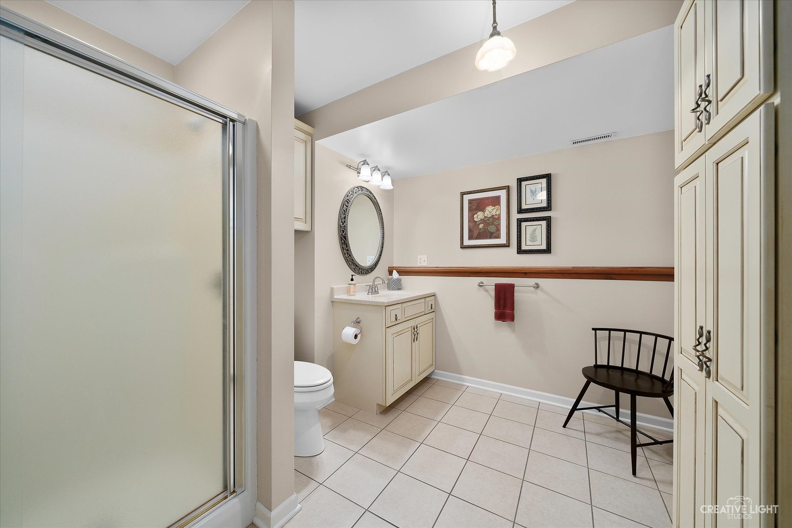 8S840 Dugan Road Big Rock, IL 60511 - Photo 11 of 31 a bathroom with a toilet sink and mirror