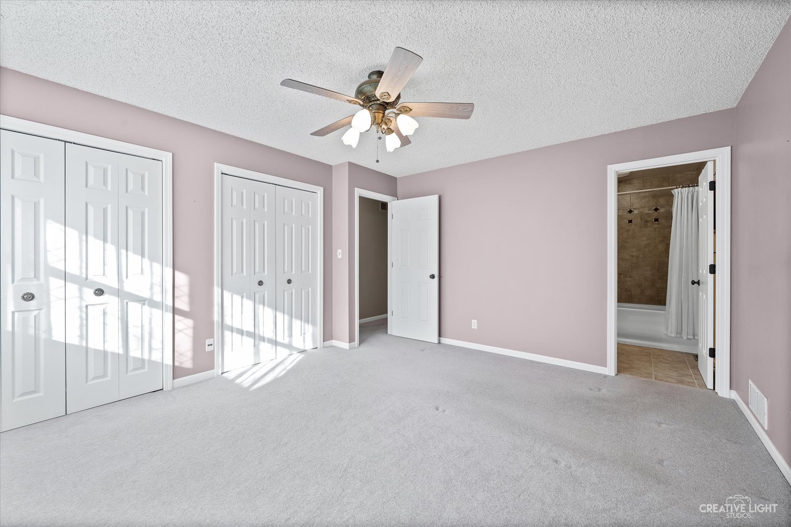 8S840 Dugan Road Big Rock, IL 60511 - Photo 12 of 31 a view of a livingroom with a ceiling fan and window