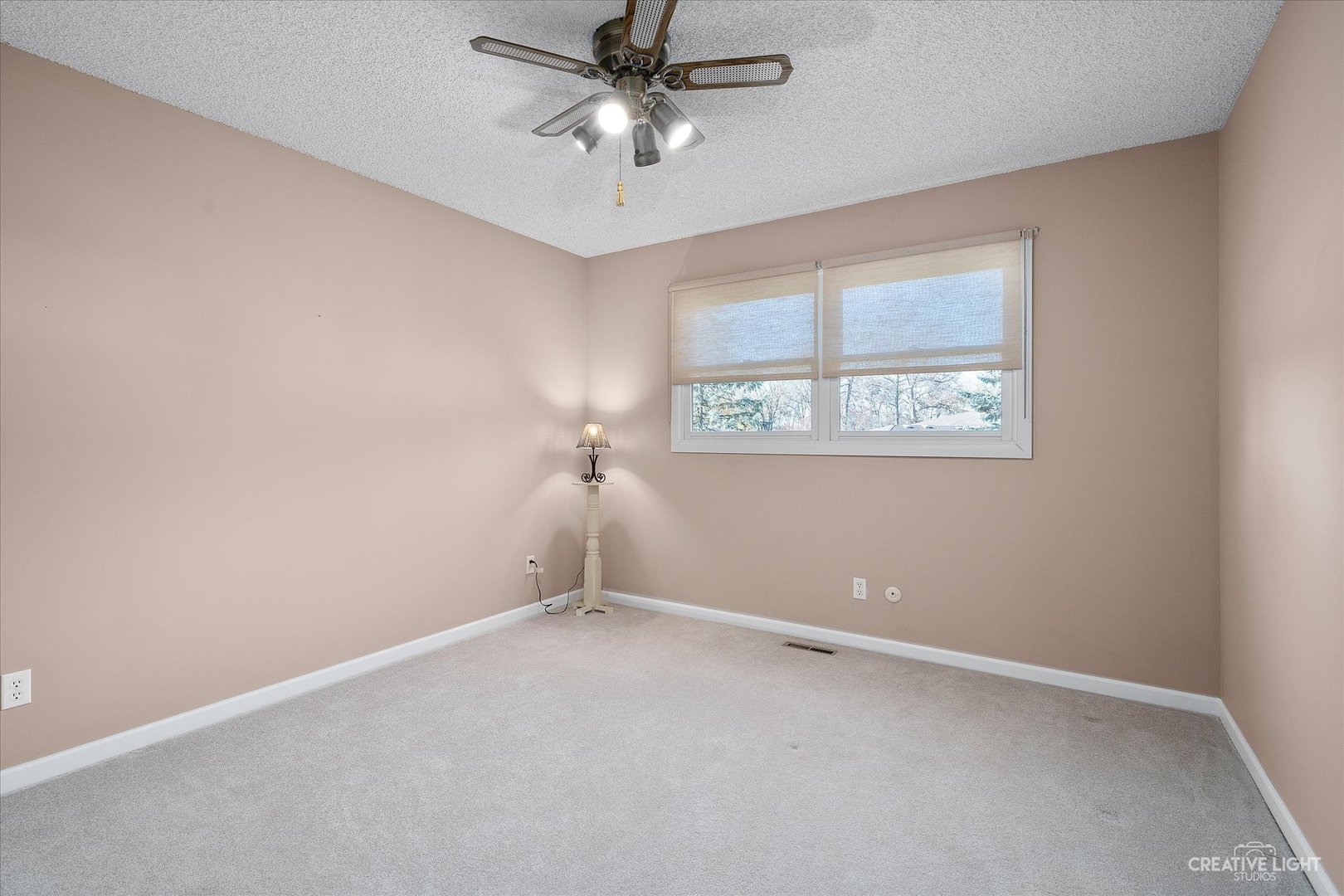 8S840 Dugan Road Big Rock, IL 60511 - Photo 15 of 31 an empty room with a window and a fan