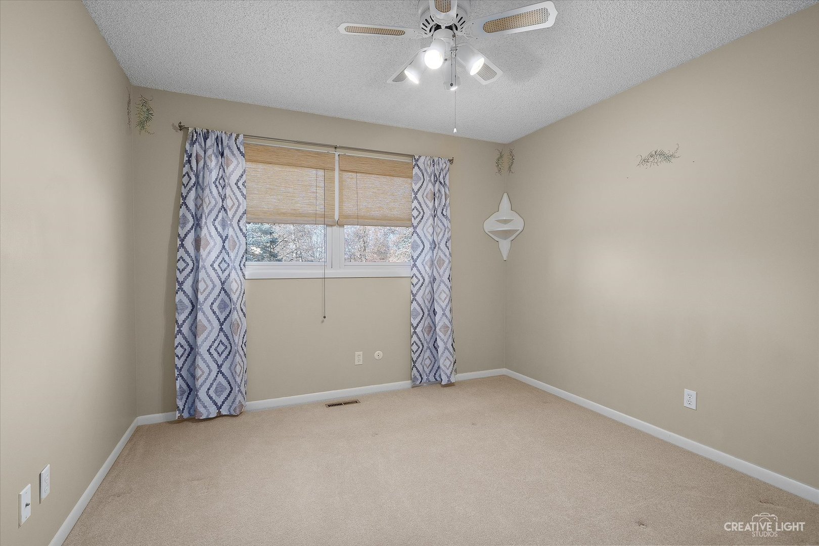 8S840 Dugan Road Big Rock, IL 60511 - Photo 16 of 31 a view of an empty room with window and chandelier fan