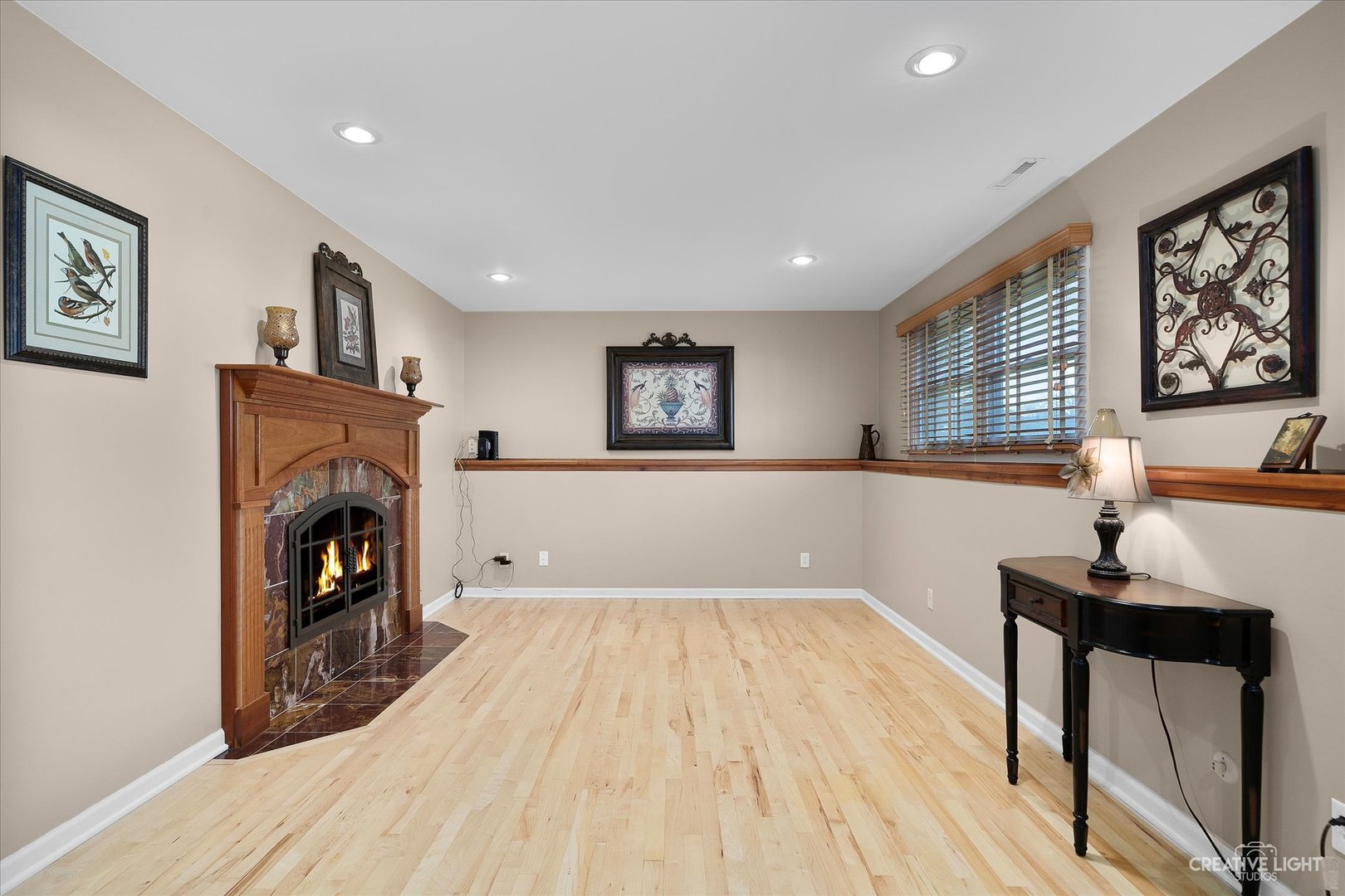 8S840 Dugan Road Big Rock, IL 60511 - Photo 8 of 31 a view of a livingroom with furniture a fireplace and wooden floor
